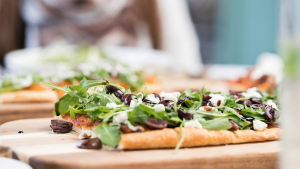 flatbread loaded with herbs, cheese, and more